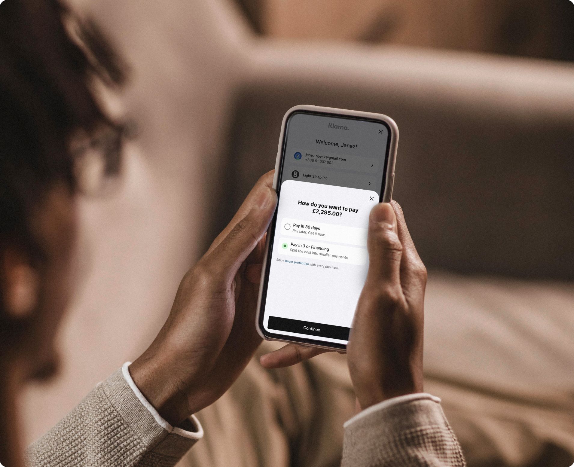 Person using phone to explore payment plan options